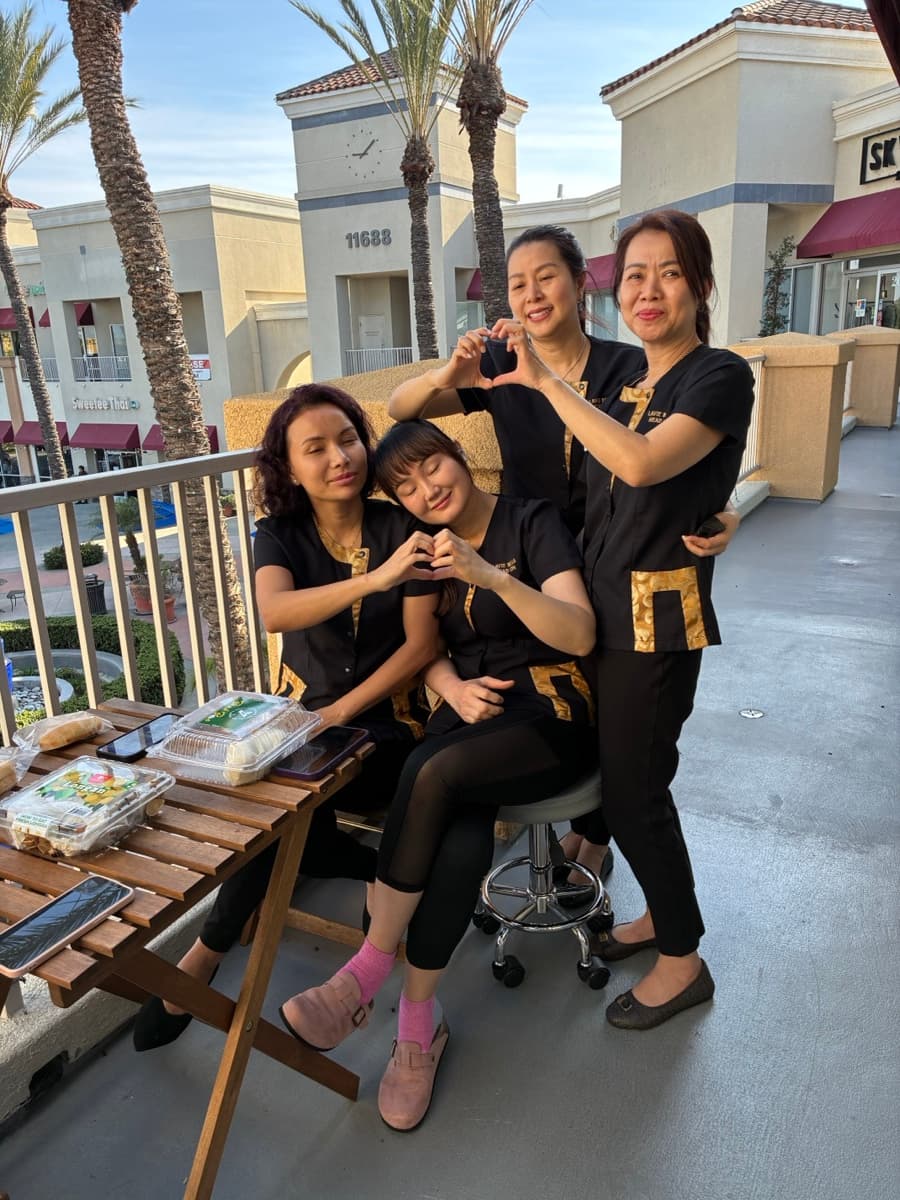 Full team outside Lavie Bella storefront