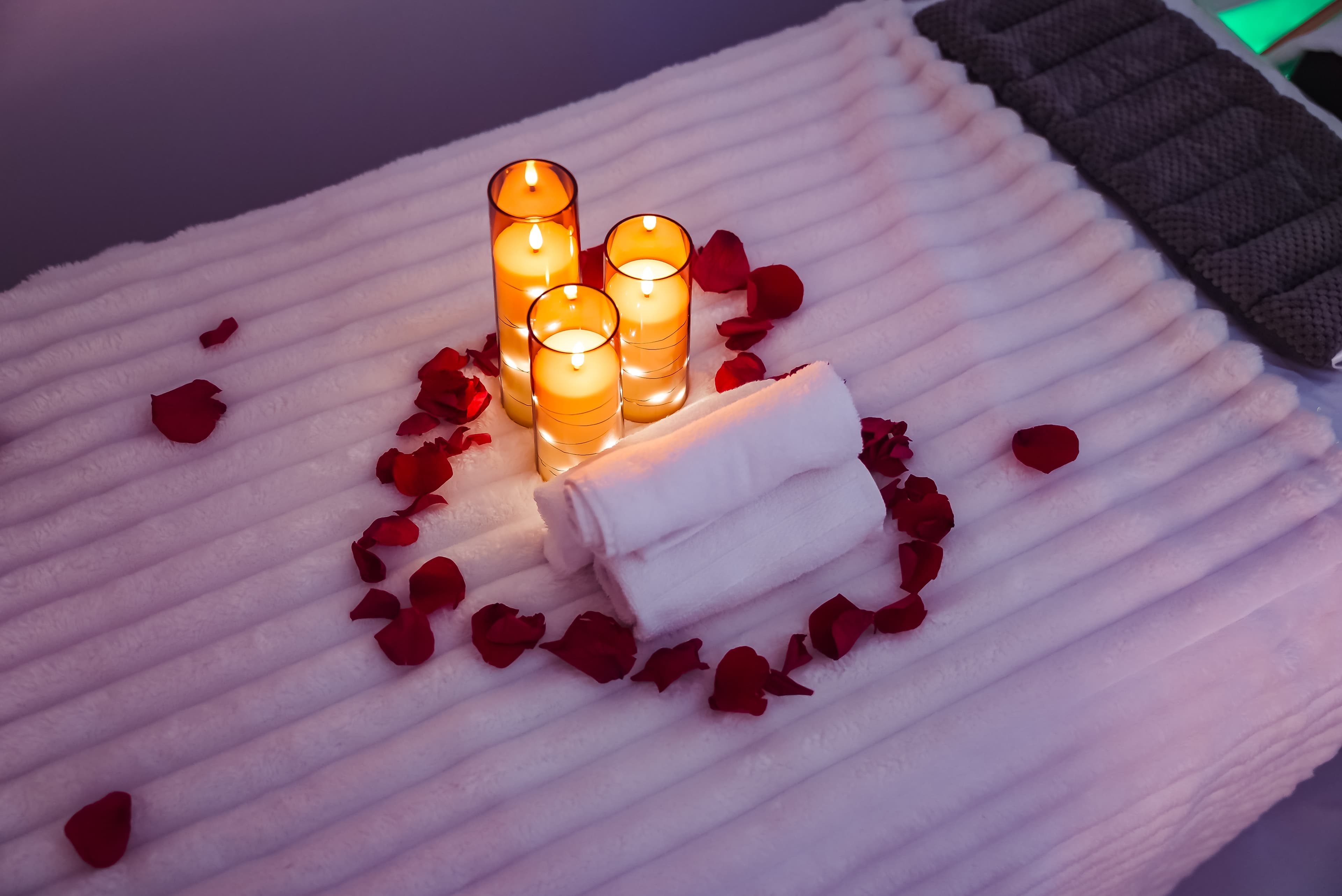 Private couples suite at Lavie Bella set with candles and rose petals